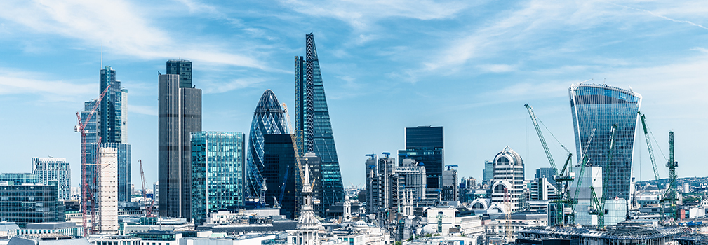 a cityscape showing a number of large buildings in the daylight